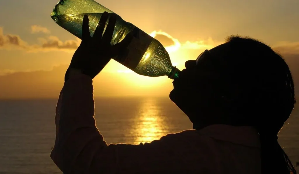 Man drinking water in outdoor